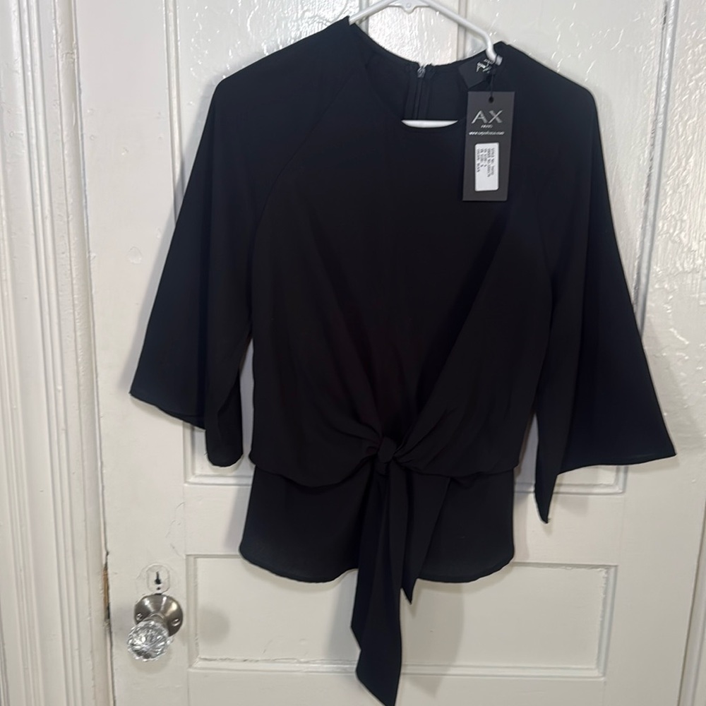 AX Paris blouse black. very cute and stylish. NWT. size 4